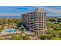 Luxury beachfront condo building with pool and ocean views at 1211 Gulf Of Mexico Dr # 603, Longboat Key, FL 34228