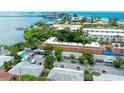 Aerial view showcasing the community's location near the water at 1603 Gulf N Dr # 24, Bradenton Beach, FL 34217