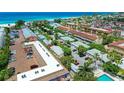 Aerial view of the complex, highlighting its proximity to the beach at 1603 Gulf N Dr # 24, Bradenton Beach, FL 34217