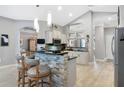 Modern kitchen with stainless steel appliances and an island at 16806 5Th Ne Ter, Bradenton, FL 34212