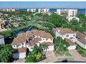 Waterfront community with luxury homes and lush landscaping at 1906 Harbour Links Cir # 14, Longboat Key, FL 34228