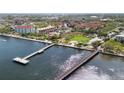Aerial view of waterfront area with pier and walking paths at 204 3Rd W St # 203, Bradenton, FL 34205