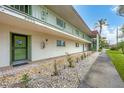 Building exterior, showcasing walkway and entrance at 3500 Beneva Rd # 303, Sarasota, FL 34232