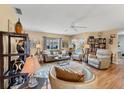 Spacious living room with hardwood floors and comfortable seating at 4045 Oakhurst Dr # 3125, Sarasota, FL 34233