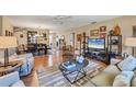 Open concept living and dining area with hardwood floors at 4045 Oakhurst Dr # 3125, Sarasota, FL 34233