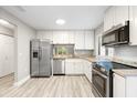 Modern kitchen with stainless steel appliances and granite countertops at 6401 Pelican Dr # 80A, Bradenton, FL 34210