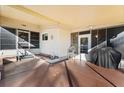 Screened-in patio with seating area and grill at 808 53Rd E Ave # 226L, Bradenton, FL 34203