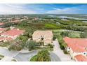 Upscale community boasting waterfront property and lush landscaping at 9711 Sea Turtle Ter # 102, Bradenton, FL 34212