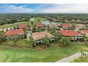 Residential community featuring a golf course and tranquil lake views at 9711 Sea Turtle Ter # 102, Bradenton, FL 34212