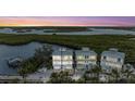 Three-story house, waterfront property with boat dock at 3524 Walker Is, Bradenton, FL 34208