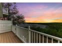 Deck overlooking the peaceful waterfront at sunset at 3524 Walker Is, Bradenton, FL 34208