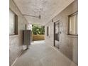 Shared condo hallway with access to a patio at 3544 Lake Bayshore Dr # K123, Bradenton, FL 34205