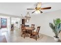 Charming dining room with a wooden table and chairs at 3751 Lake Bayshore Dr # H304, Bradenton, FL 34205