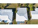 Rooftop view of houses with white tile roofs at 804 Buttonwood Dr, Bradenton, FL 34208