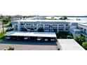 Exterior view of condo building showcasing parking at 4726 Independence Dr # 4726, Bradenton, FL 34210