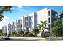 Modern building exterior, featuring balconies and palm trees at 4950 Remington Dr # 214, Sarasota, FL 34234