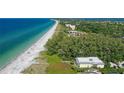 Aerial view showcasing beachfront property and community at 5311 Gulf Of Mexico Dr # 3, Longboat Key, FL 34228