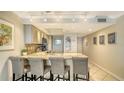 Kitchen with granite countertops and stainless steel appliances at 5311 Gulf Of Mexico Dr # 3, Longboat Key, FL 34228