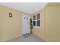 Bright condo entry with a beachy vibe at 615 Riviera Dunes Way # 104, Palmetto, FL 34221