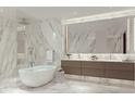 Elegant bathroom with marble finishes, soaking tub, and double vanity at 668 Quay Commons # 0705, Sarasota, FL 34236