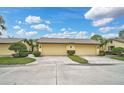 Houses with attached garages and neatly kept landscaping at 7146 Lakeside Dr, Sarasota, FL 34243