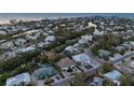 Aerial view showing home's location in a residential neighborhood at 127 Crescent Dr, Anna Maria, FL 34216