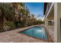 Relaxing rectangular pool with a patio at 127 Crescent Dr, Anna Maria, FL 34216