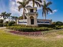 Heritage Landing community entrance sign with landscaping at 14191 Heritage Landing Blvd # 1244, Punta Gorda, FL 33955