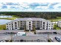 Aerial view of apartment building with covered parking at 18114 Gawthrop Dr # 404, Bradenton, FL 34211