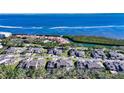 Aerial view of home and waterfront community at 2195 Harbourside Dr # 404, Longboat Key, FL 34228