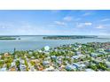 Wide shot of waterfront home and neighborhood, highlighting location and surroundings at 2213 Avenue B, Bradenton Beach, FL 34217