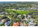 Aerial view of house and golf course community at 227 Saint James Park, Osprey, FL 34229