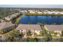 Aerial view of townhomes community near a lake at 3715 45Th W Ter # 108, Bradenton, FL 34210