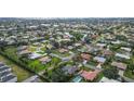 Bird's-eye view of house and neighborhood, showcasing location and landscape at 462 Rubens E Dr, Nokomis, FL 34275