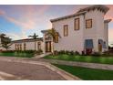 Elegant two-story home showcasing clean lines and a welcoming entryway at 5902 Red Mangrove Ln, Bradenton, FL 34210