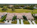 Community of villas with lush green lawns and golf course views at 6085 Clubside Dr # 7682, Sarasota, FL 34243