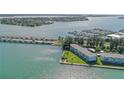 Aerial view of waterfront property near bridge and marina at 777 John Ringling Blvd # 2, Sarasota, FL 34236