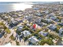 Aerial view showcasing a house's location in a residential area at 128 51St St # A, Holmes Beach, FL 34217