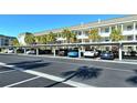 Covered parking lot with ample spaces for residents at 4310 Falmouth Dr # A104, Longboat Key, FL 34228