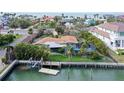 Aerial view of house near waterway and beach at 5830 Gulf Of Mexico Dr, Longboat Key, FL 34228