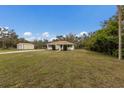 House with detached garage and expansive yard at 6424 18Th E Ave, Bradenton, FL 34208