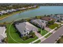 Aerial view showcasing a house in a waterfront community at 712 Sigsbee Loop, Sarasota, FL 34240