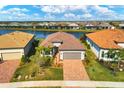 Property view from above showing lake access at 7432 Summerland Cv, Lakewood Ranch, FL 34202