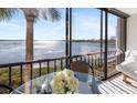 Condo boasts amazing water views from its comfortable seating area at 1602 Stickney Point Rd # 1602-301, Sarasota, FL 34231