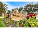 Elegant entrance to the community of Restancia with beautiful landscaping at 7716 Club Ln, Sarasota, FL 34238