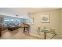 Bright living room with comfortable seating and coastal decor at 800 Benjamin Franklin Dr # 602, Sarasota, FL 34236