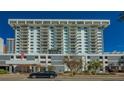Modern high rise building exterior, featuring clean lines and a sleek design at 101 S Gulfstream Ave # 8G, Sarasota, FL 34236