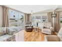 Living room with hardwood floors and sliding glass doors at 1211 45Th E Ave, Ellenton, FL 34222