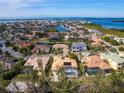 Luxury home with pool and solar panels in a waterfront community at 12317 Baypointe Ter, Cortez, FL 34215