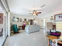 Spacious living room with comfy seating and a large TV at 2523 Darwin Ave, Sarasota, FL 34239